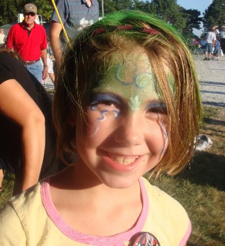 Raynee Stohlmann, daughter of Nicole Folden, showed off her new hair color and painted face. - Raynee